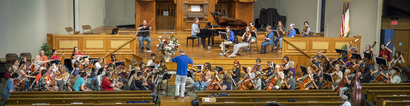 orchestra rehearsing in the church